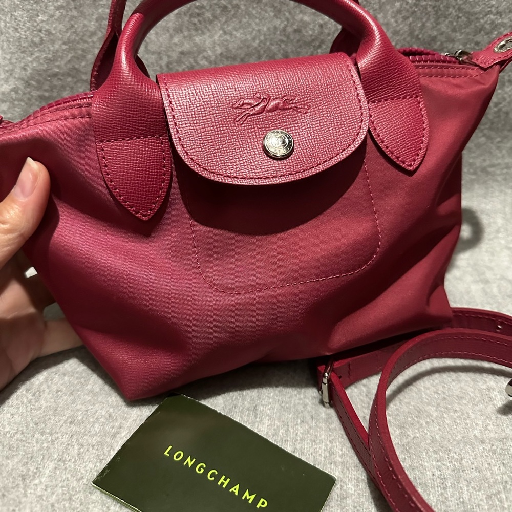 Le Pliage Longchamp small red nylon satchel. Never used, brand new.